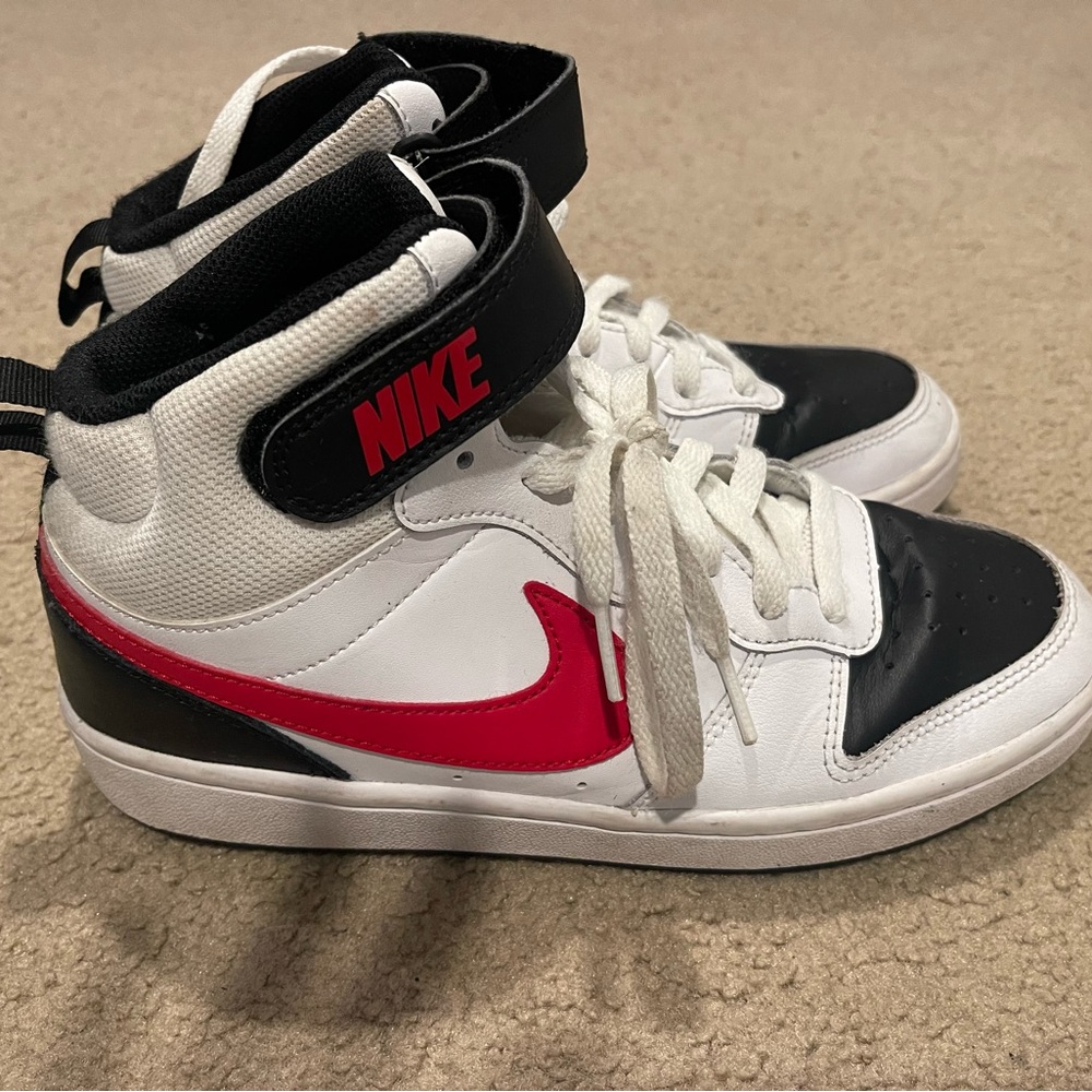 Nike Kids' White and Black Sneakers with Red Swoosh